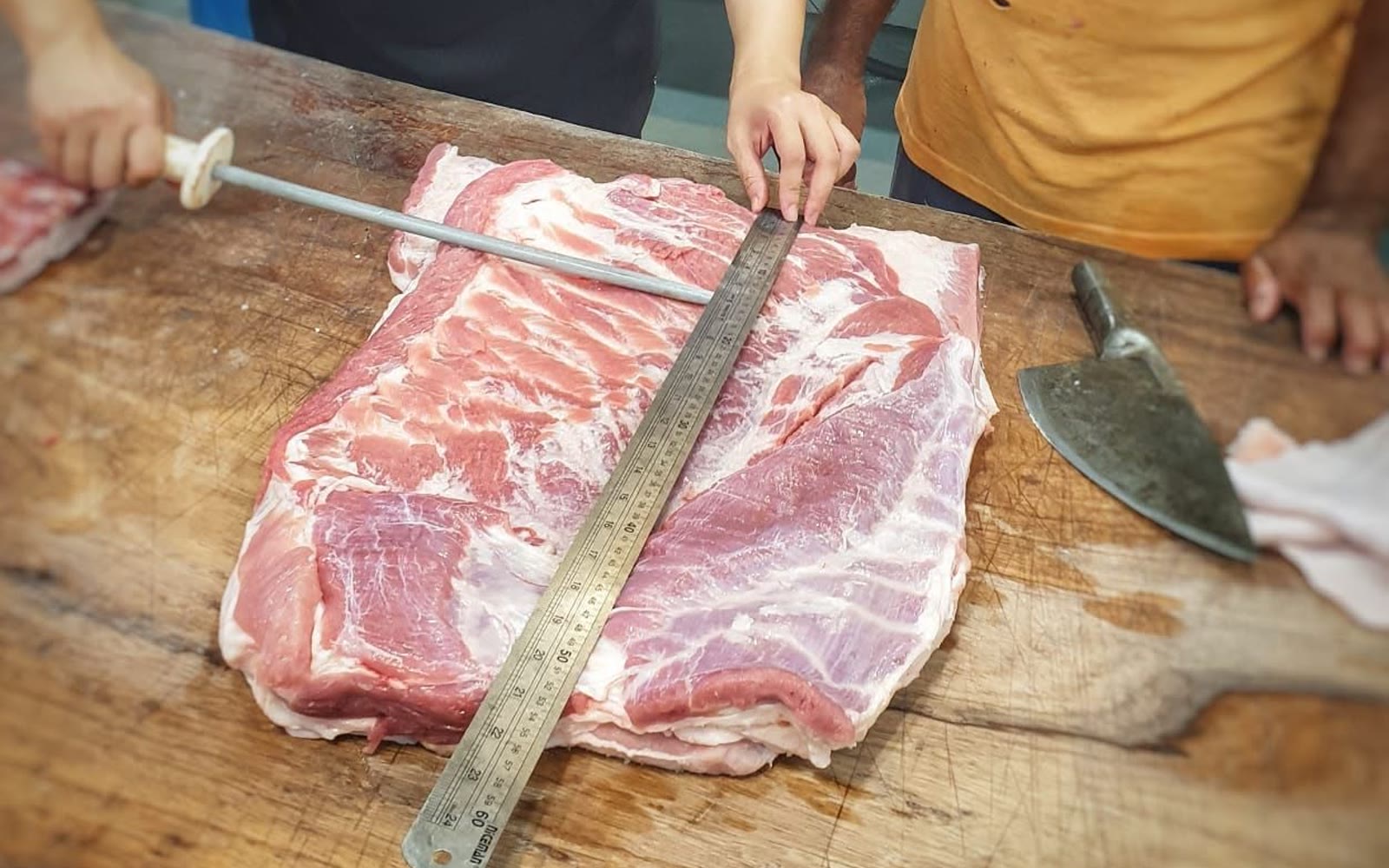 Tailor cut service: measuring and cutting to the customer's order